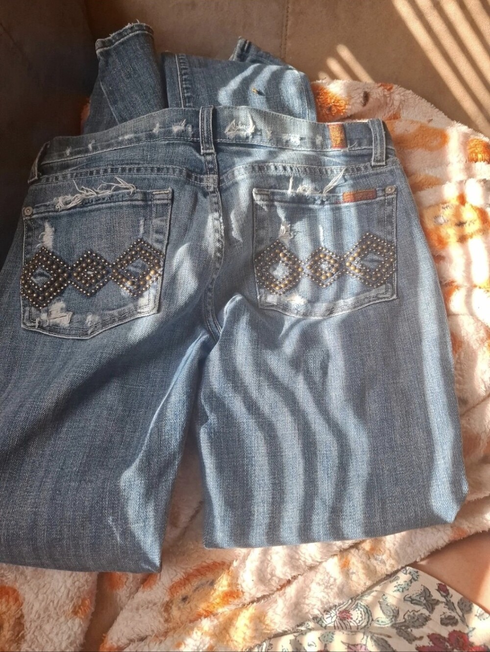 7 For All Mankind Distressed Blue Denim Bootcut Jeans with Studded Pocket Detail